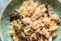 Creamy Chicken Risotto with Earthy Mushrooms and Aromatic Thyme