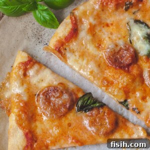 A perfectly baked Smoked Gouda and Chorizo Pizza, ready to be served.