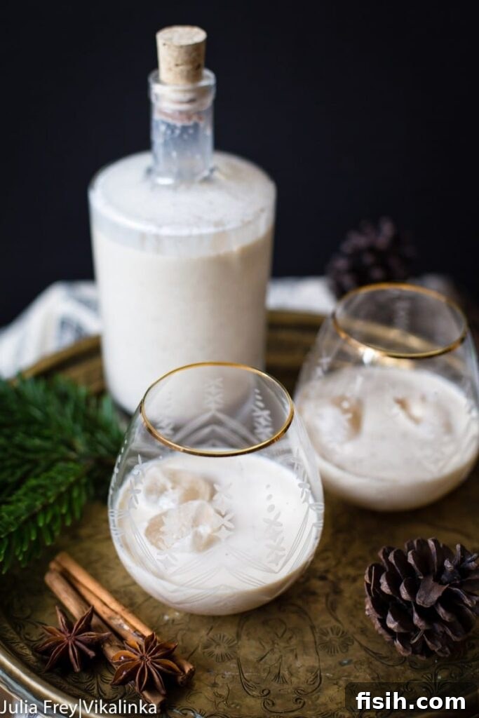 Handcrafted Holiday Eggnog 2 bottle of eggnog with two glasses