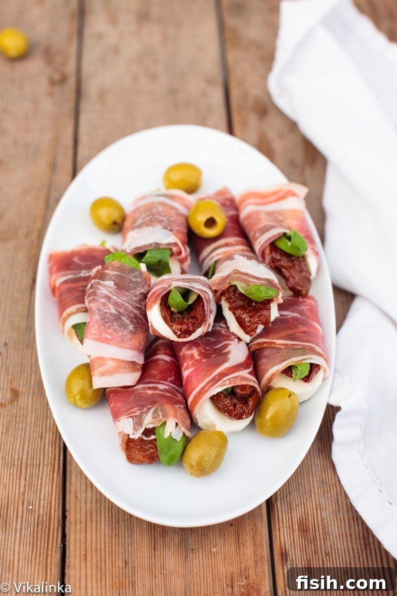 top down of Prosciutto Caprese Parcels on white plate