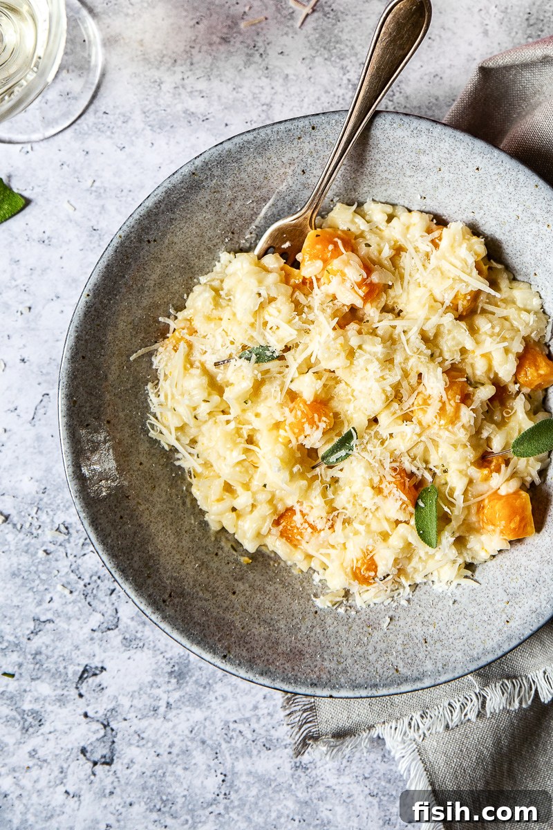 Velvety Butternut Risotto with Aromatic Sage and Creamy Goat Cheese 5 Top down view of Butternut Squash Risotto with a fork