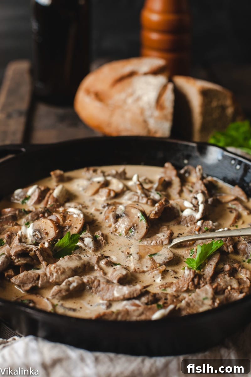 Russian Stroganoff, rye bread in the background