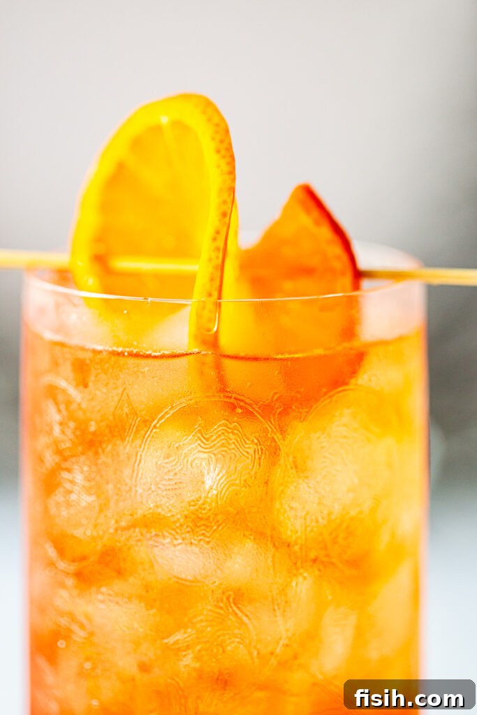 Close up of top of glass showing garnish