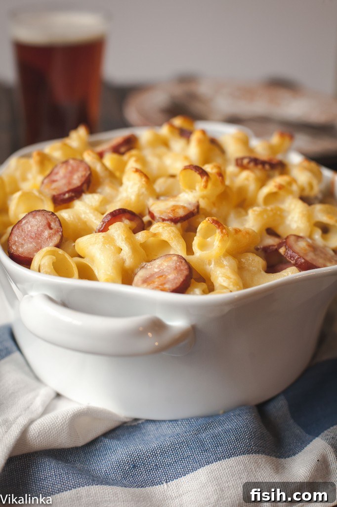 Decadent Two-Cheese Macaroni with Hearty Polish Kielbasa 3 Dish of mac and cheese on a table