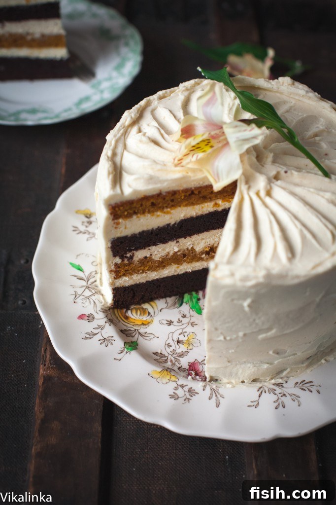 Spiced Pumpkin Chocolate Decadence with Mascarpone Creme 7 An inviting angled view of the finished cake, with a piece already removed, beckoning tasters to enjoy.