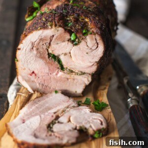 Side view of sliced pork on cutting board