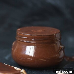 Side shot of homemade nutella in jar