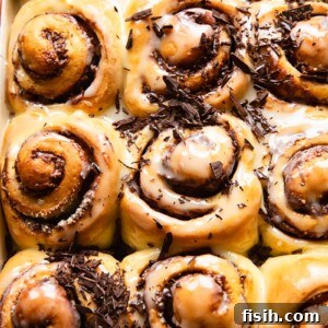 Overnight Nutella Rolls sprinkled with chopped chocolate