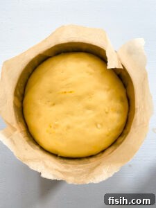 proved dough for Easter bread in a pan