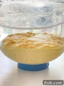 dough in a glass mixing bowl