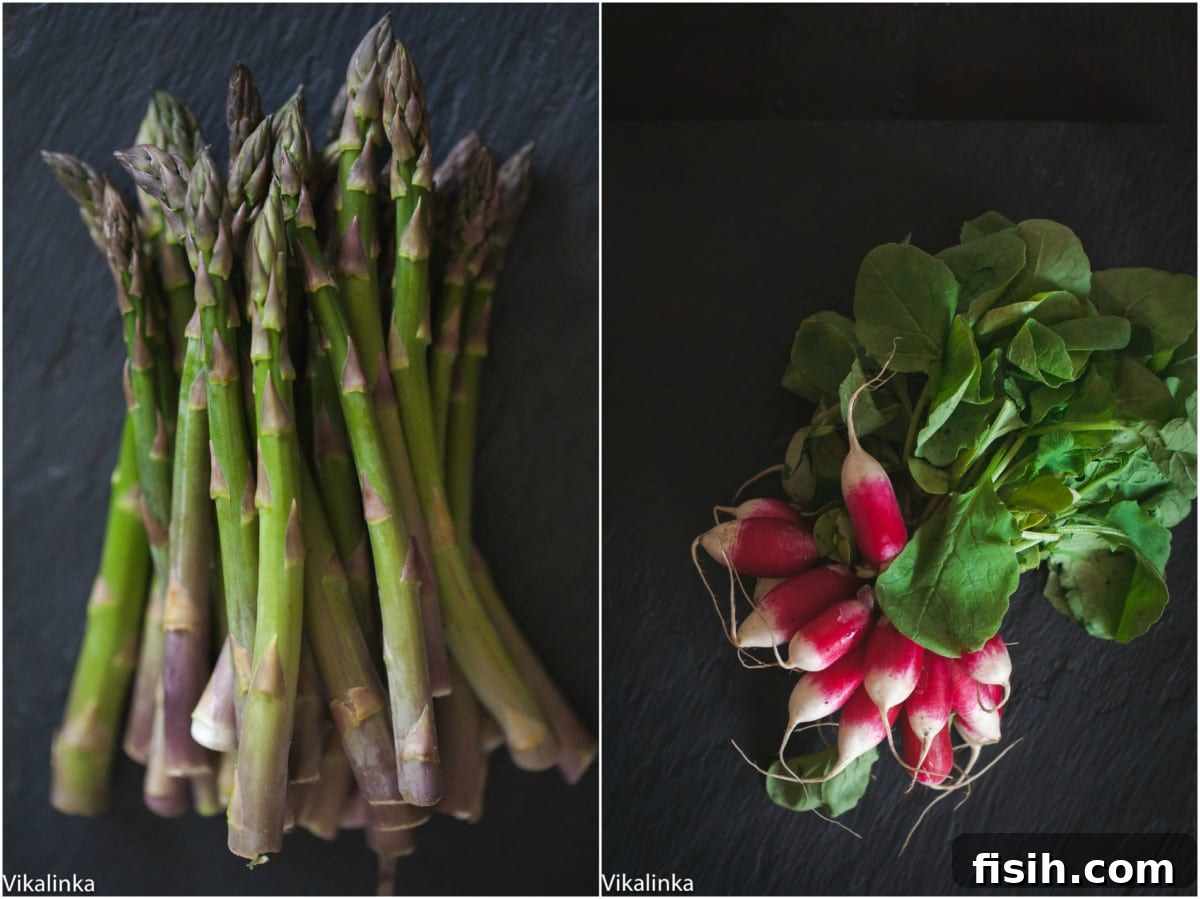 Crisp Roasted Asparagus and Radishes with Zesty Mustard Vinaigrette 4 Close-up shot of fresh, raw asparagus spears and a vibrant bunch of red radishes, showcasing their natural beauty before roasting.