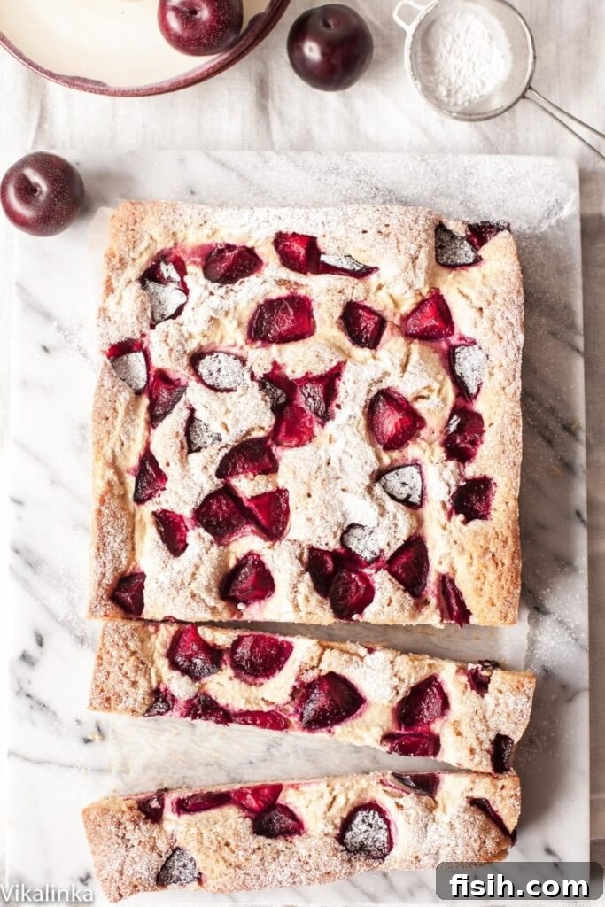 Top down view of cheesecake with two long slices cut out
