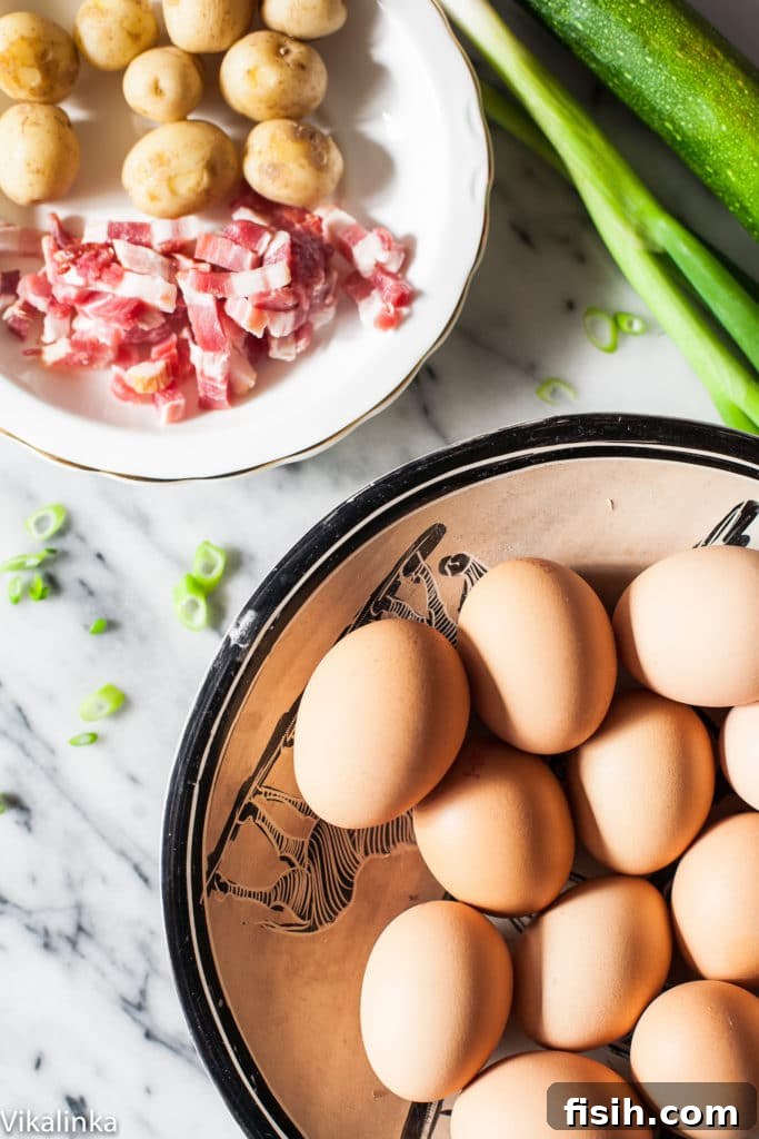 Close-up of a beautifully cooked French Omelette filled with bacon, potatoes, and zucchini