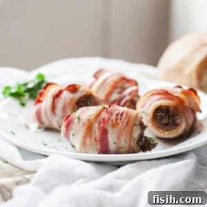 Gourmet Bacon Wrapped Chicken Thighs with Mushroom and Goat Cheese Filling 7 Close up view of several bacon wrapped chicken thighs resting on a plate, garnished and ready to serve