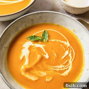blended butternut squash soup with cream swirls