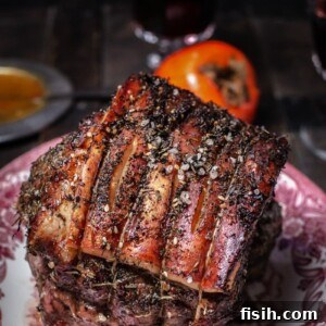 Cooked pork roast on a serving platter