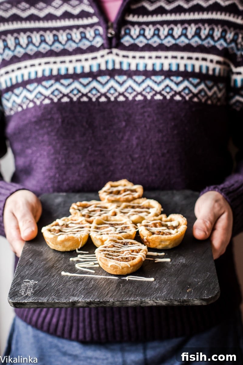 Golden Canadian Delights 3 Butter Tarts-flaky pastry tartlets filled with delicious golden custard, raisins and walnuts.