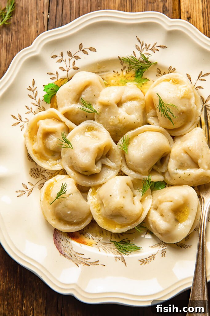 close up of pelmeni dumplings on a plate