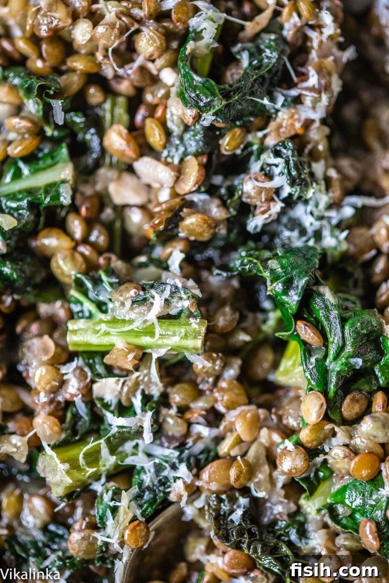 A close-up of hearty green lentils and vibrant cavolo nero kale, ready to be cooked into a delicious 'risotto'.
