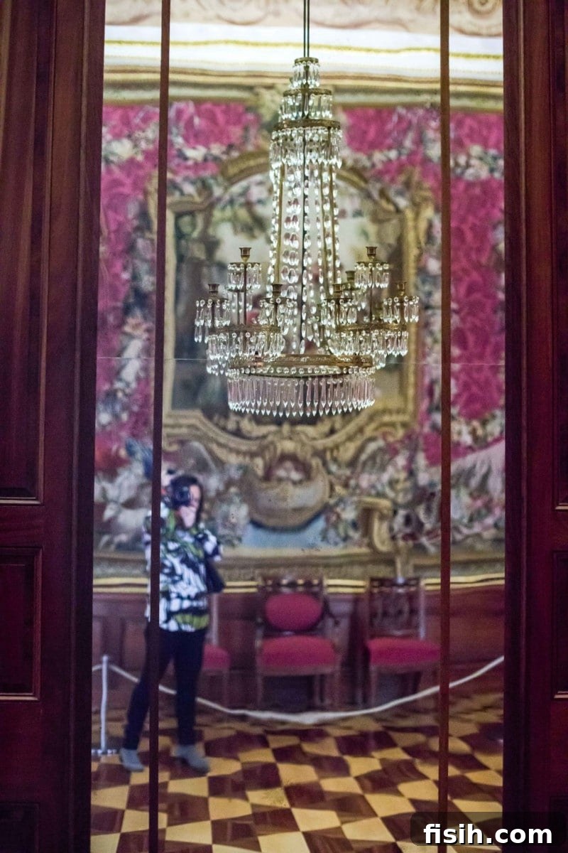 Old Berlin's Shimmering Splendor 14 A detailed view of gilded wall decorations and intricate patterns in a palace room.