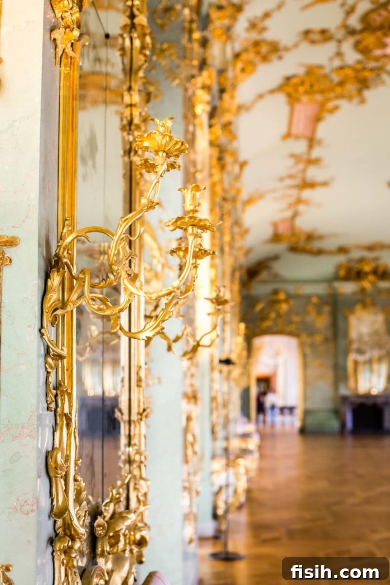 Old Berlin's Shimmering Splendor 10 View down a grand corridor in Charlottenburg Palace, adorned with classical statues and artwork.