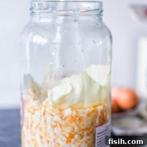 Jar of homemade cabbage sauerkraut ready for fermentation