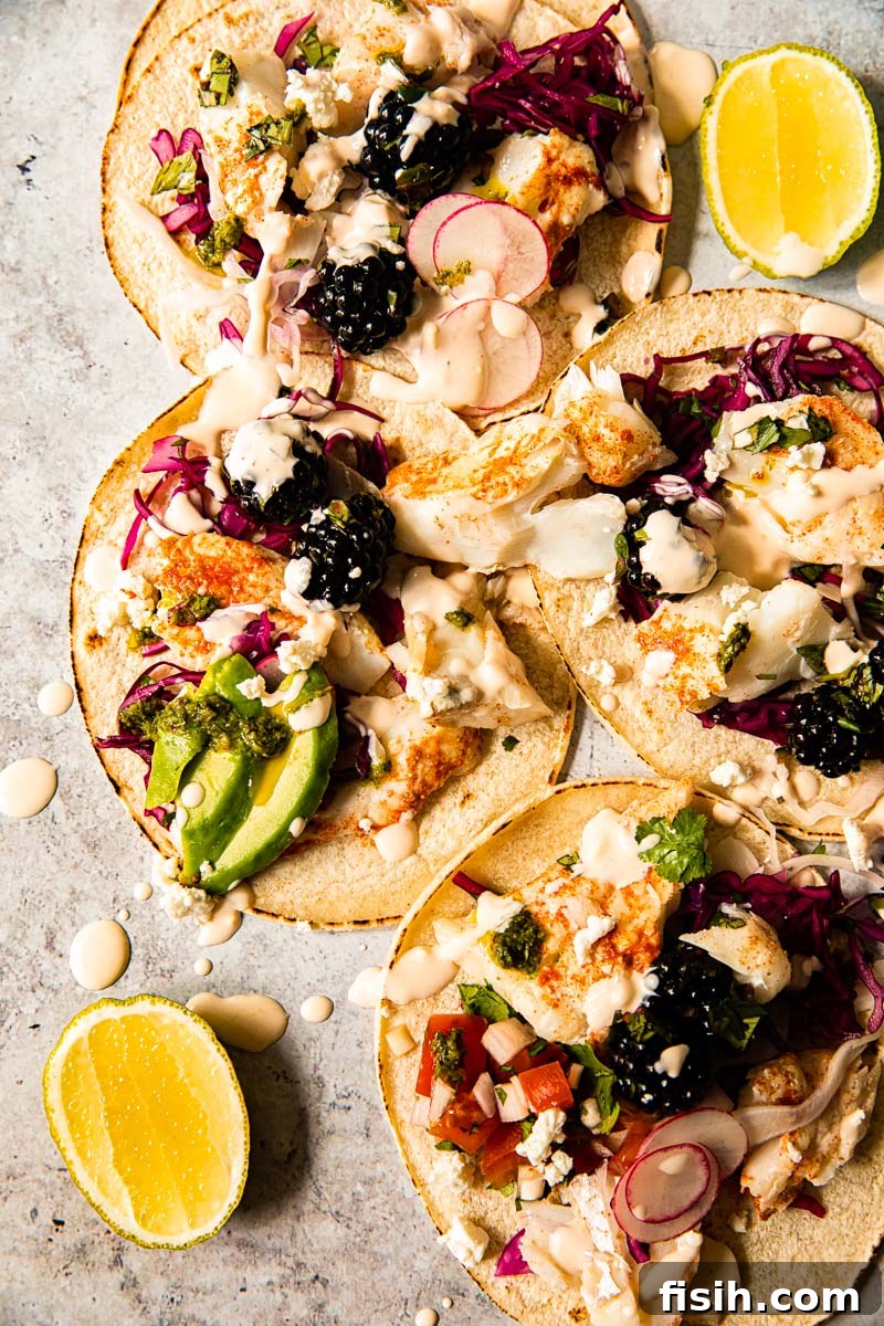 overhead view of assembled fish tacos on a platter
