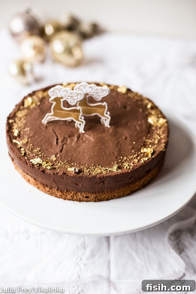 A beautifully presented Dark Chocolate Truffle Cake on a elegant cake stand, ready for a celebration.
