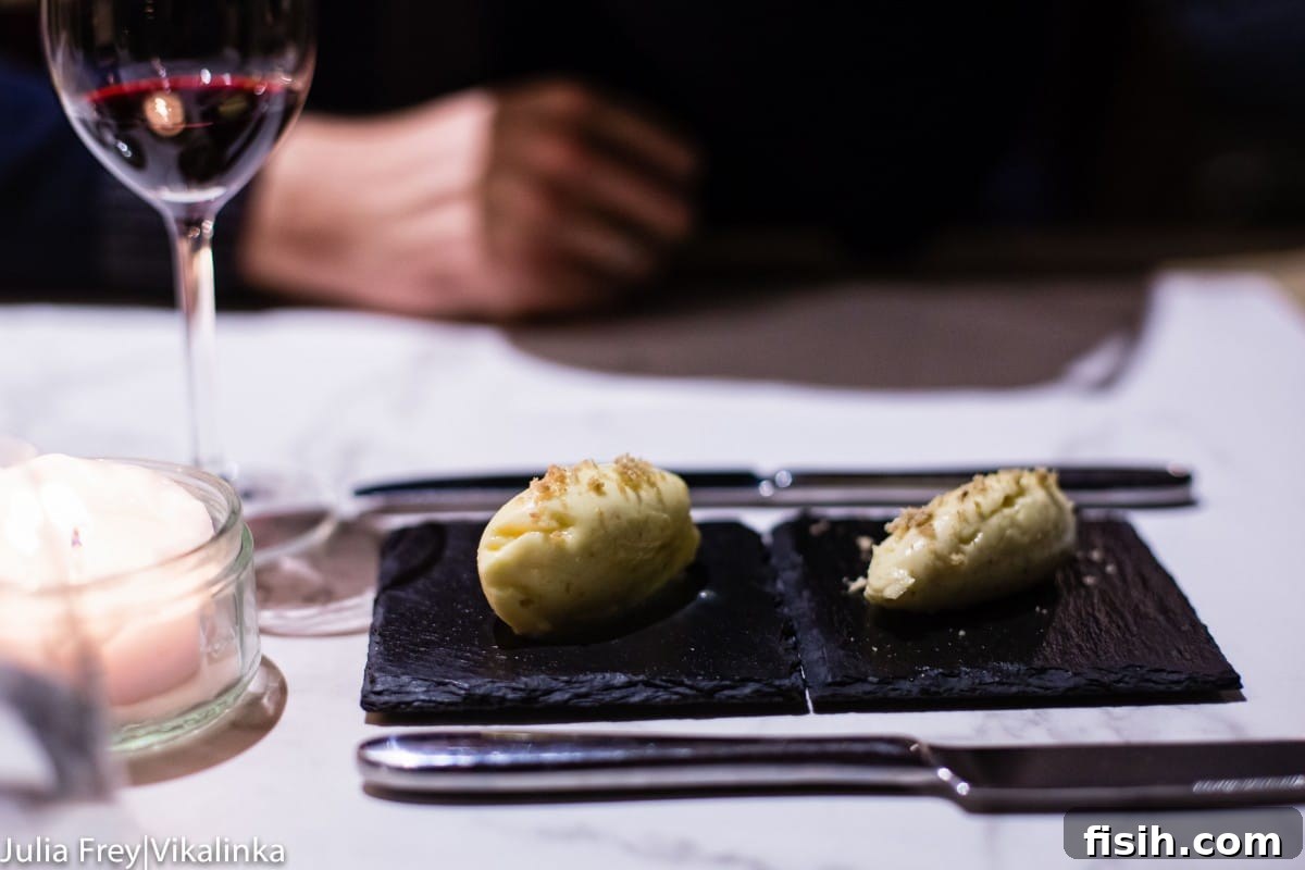 Close-up of a beautifully plated appetizer, showcasing intricate details and fresh ingredients