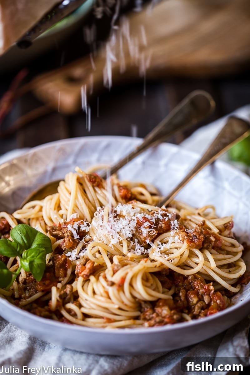 Effortless Slow Cooker Bolognese 7 A serving of slow cooker beef bolognese sauce, invitingly presented.