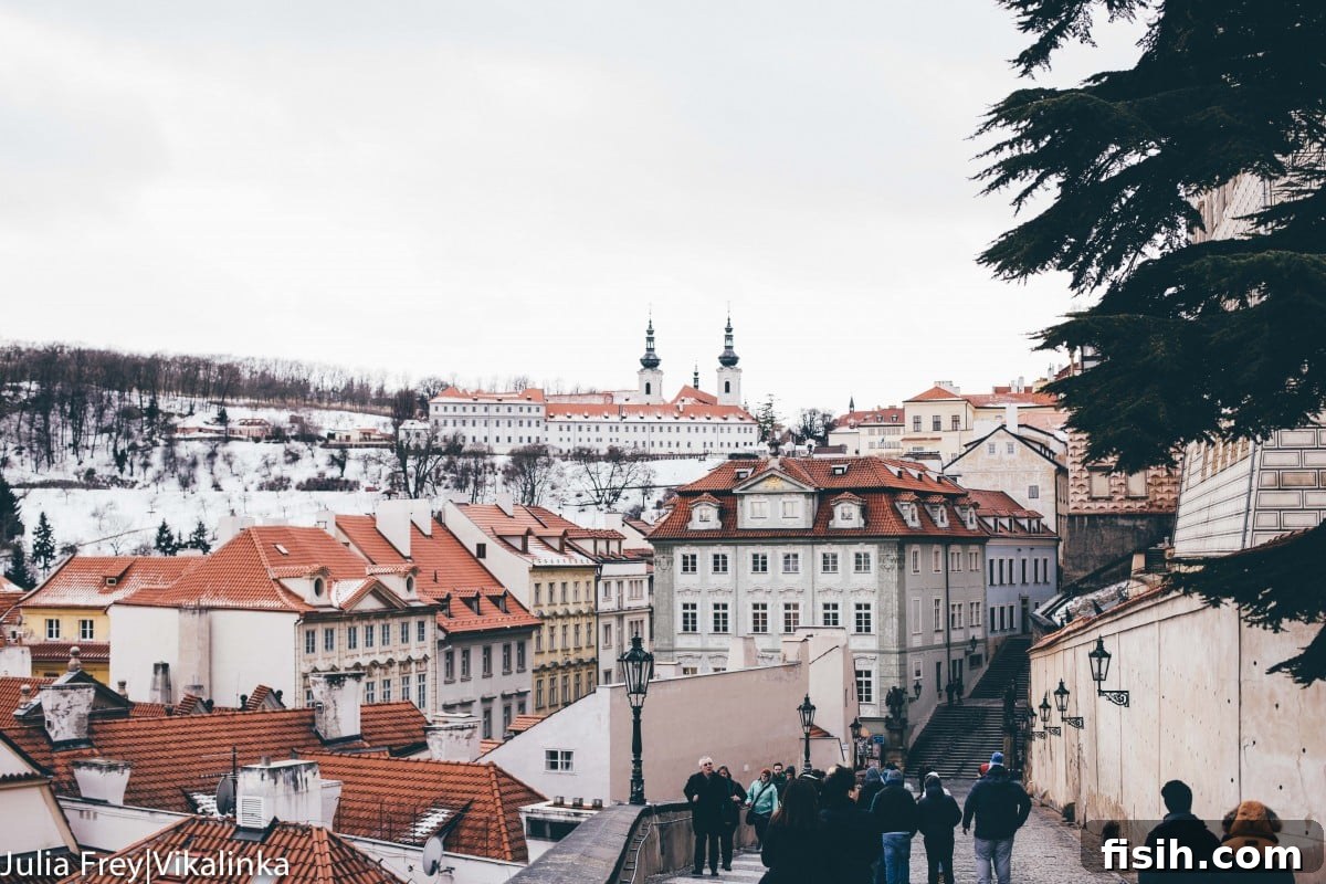 Panoramic view of Prague with historic buildings and bridges