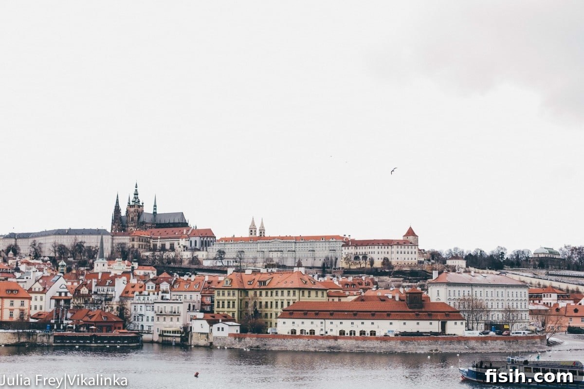 Detailed view of a Baroque statue on Charles Bridge