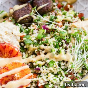 tabbouleh, hummus and falafel in a bowl