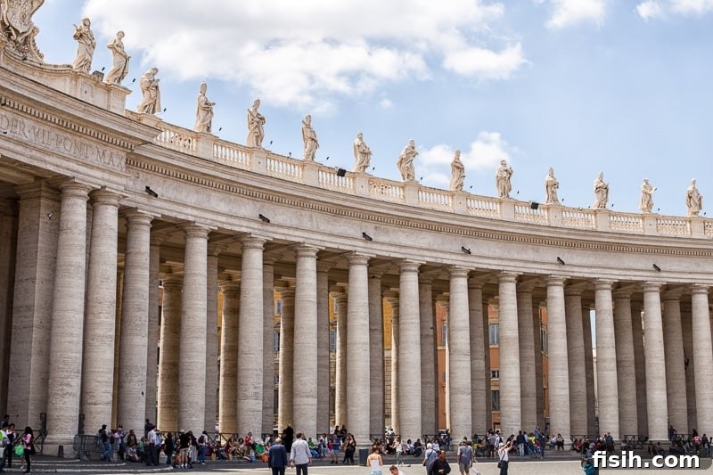 The grand colonnade of St. Peter's Basilica, designed by Bernini, framing the iconic square