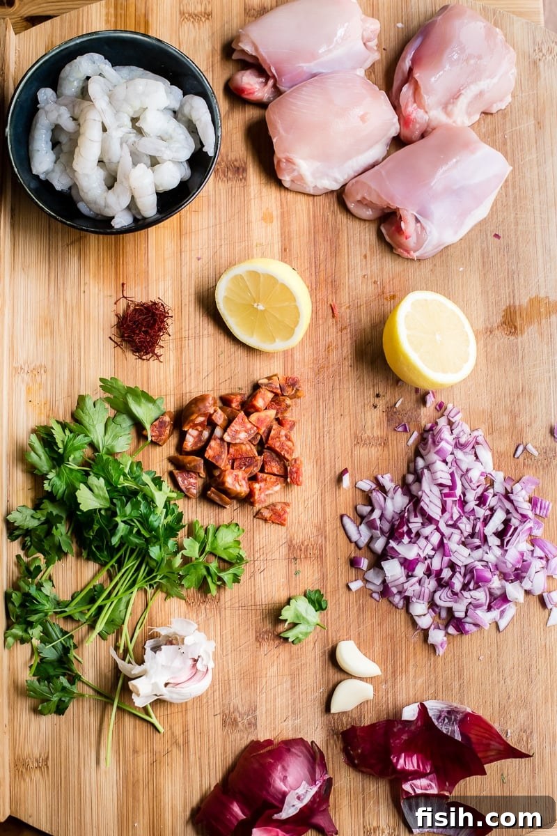 spanish rice ingredients laid out on cutting board.