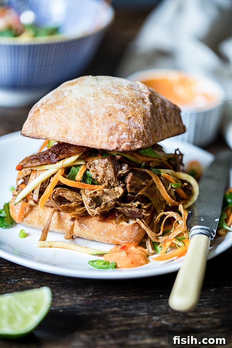 Fusion Pulled Pork Sandwiches with Zesty Root Vegetable Slaw 6 Asian pulled pork buns with carrot, zucchini and radish slaw