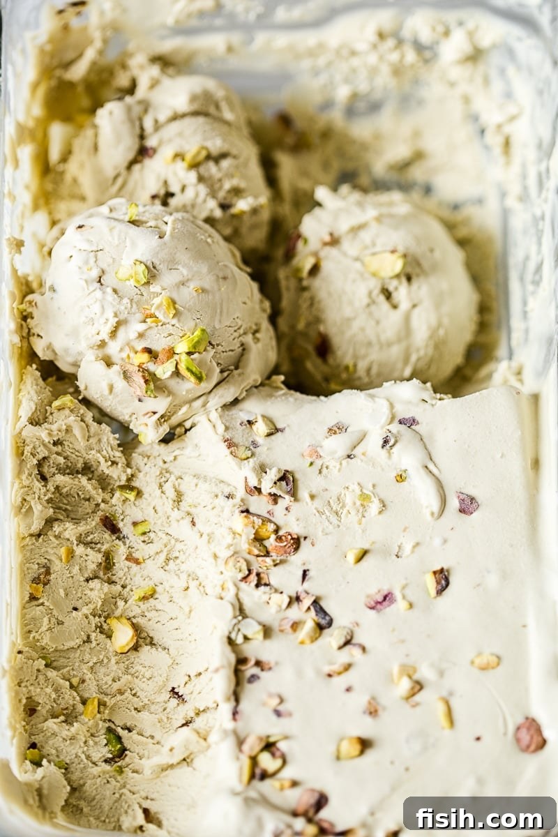 Pan with ice cream with two scoops visible