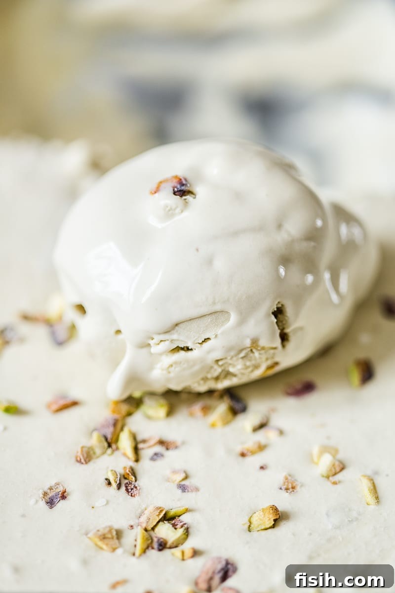 Scoop of ice cream showing nuts