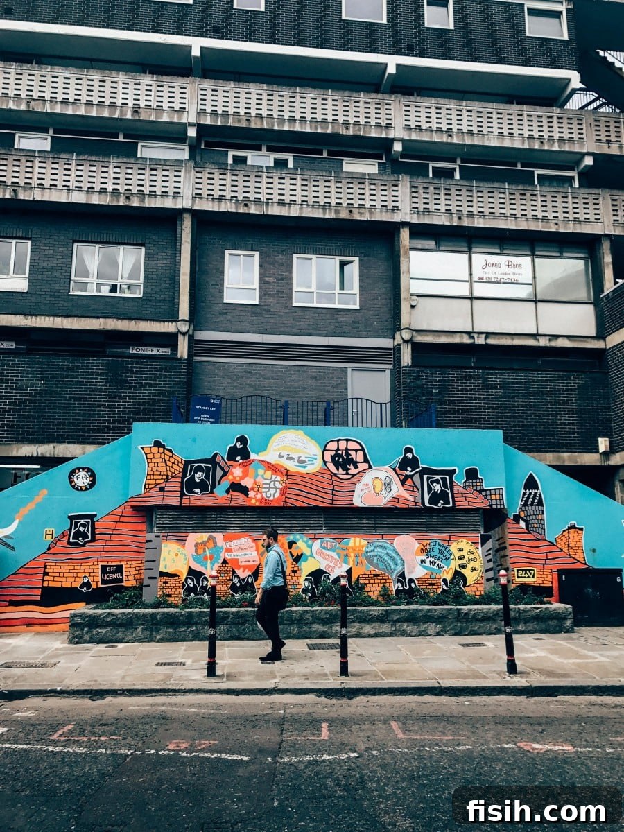 Explore Shoreditch's Vibrant Street Art 12 Vibrant Shoreditch street art on a brick wall, showcasing bold colors and dynamic forms