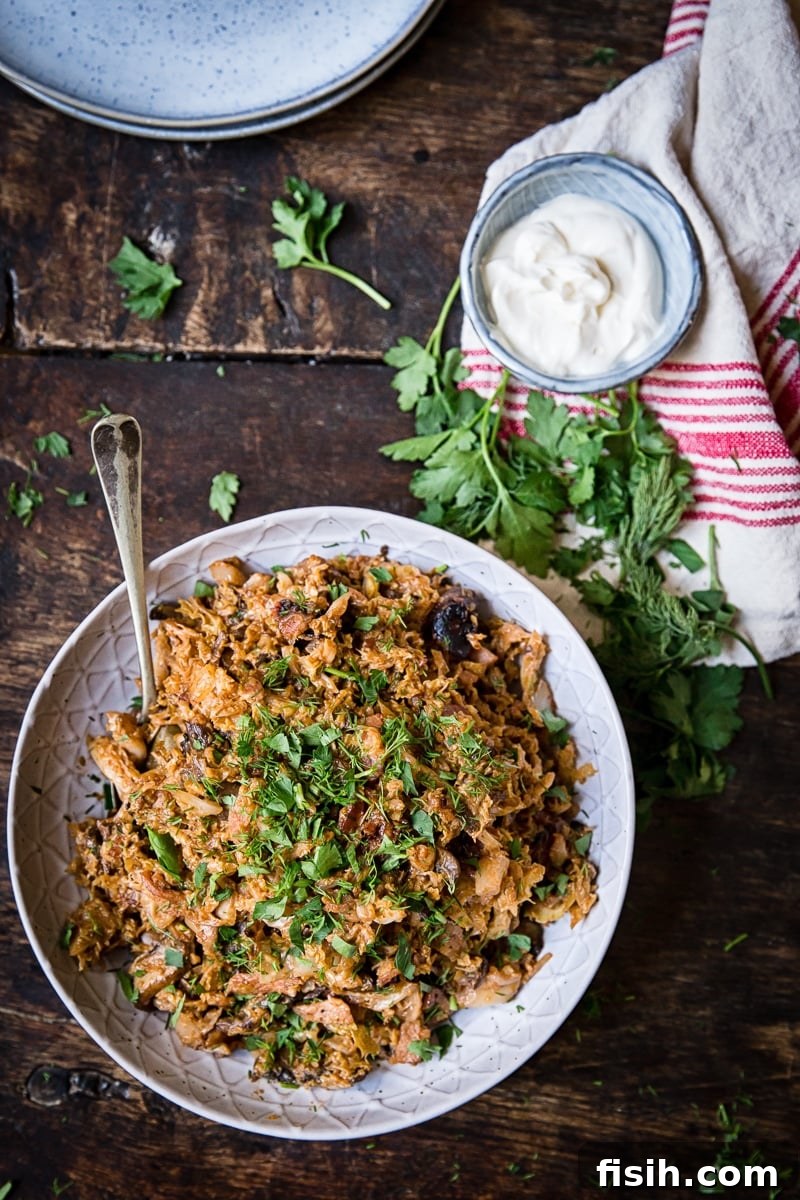 Smoky Bacon & Mushroom Savoy Braise 4 Top down of a bowl of cabbage with sour cream
