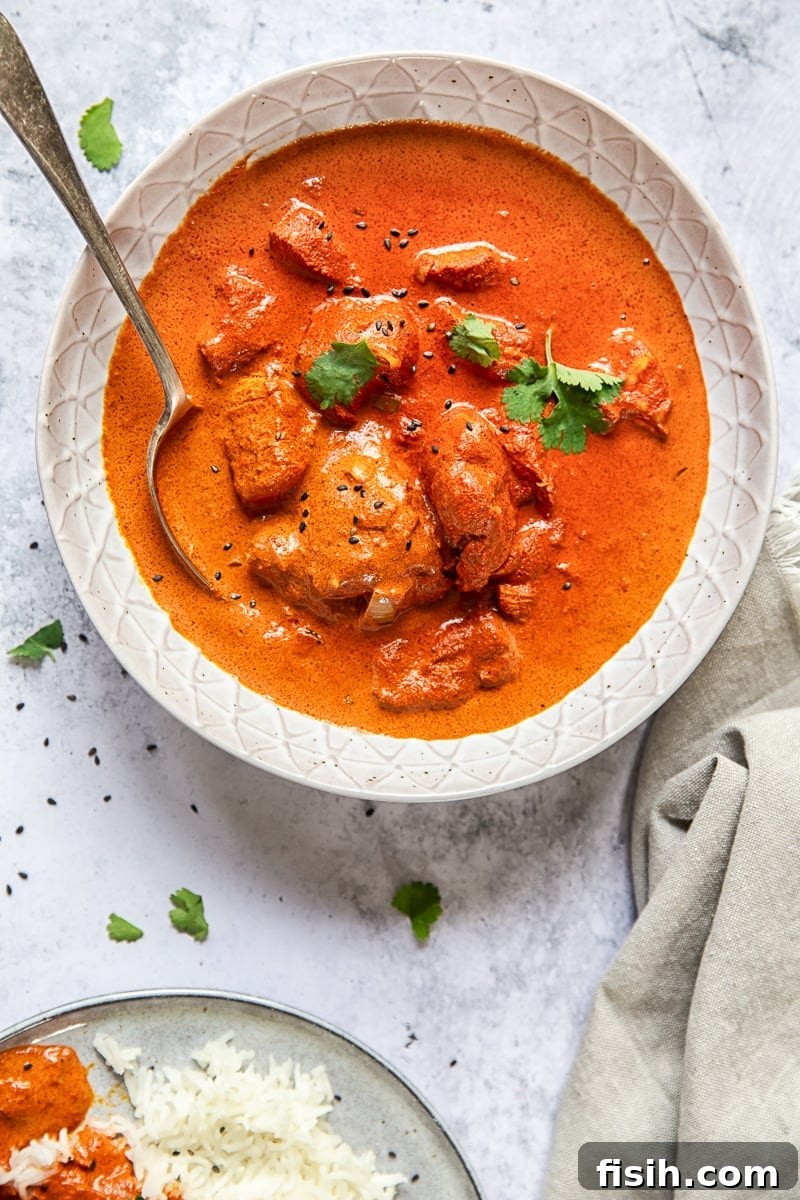 Signature Takeaway Butter Chicken 5 Close up overhead shot of a bowl with curry