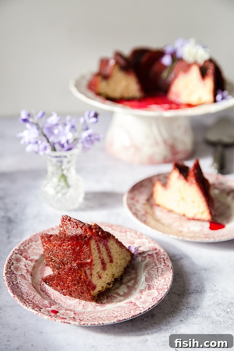 A close-up of a beautifully baked Lemon Ricotta Bundt Cake, golden brown with a rich texture, before glazing, highlighting its perfect shape.