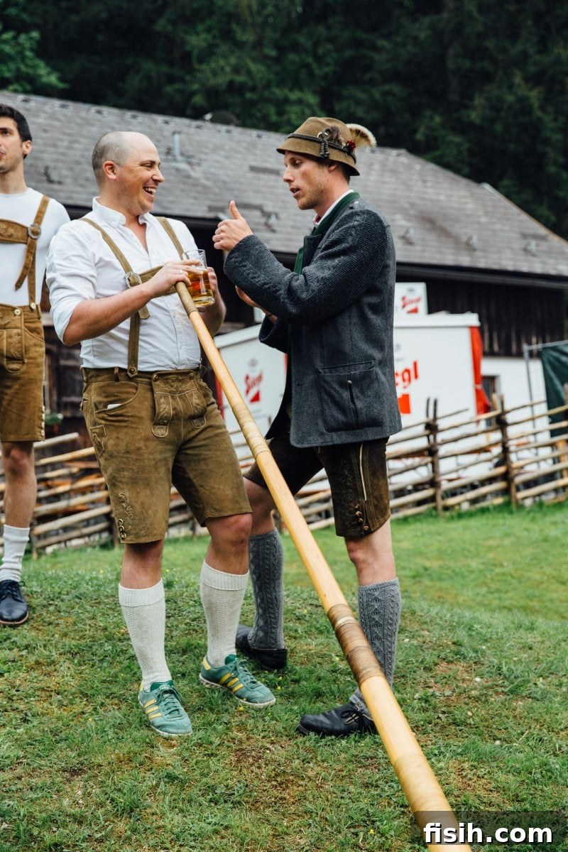 A person in traditional Austrian lederhosen learning to play the alphorn with the guidance of an instructor