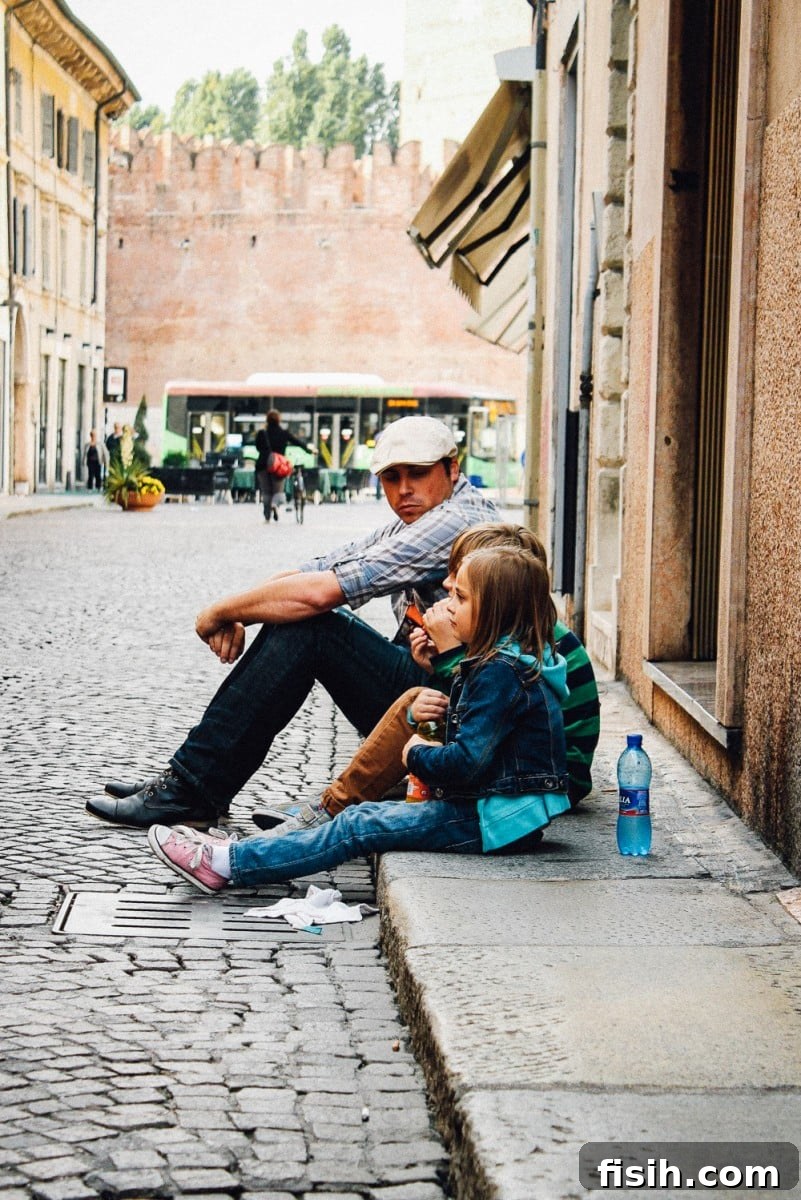 Children eating pastries at a charming cafe in a European city