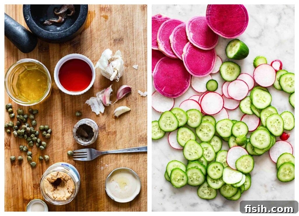 Fresh ingredients laid out for an Italian tuna salad, including canned tuna, beans, red onion, radishes, and capers