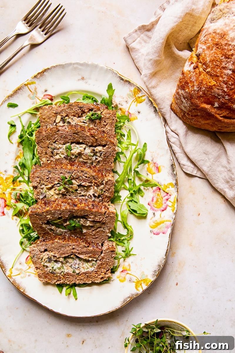 Gourmet Stuffed Meatloaf with Creamy Mushrooms 3 Meatloaf stuffed with creamed mushrooms with herbs and garlic.