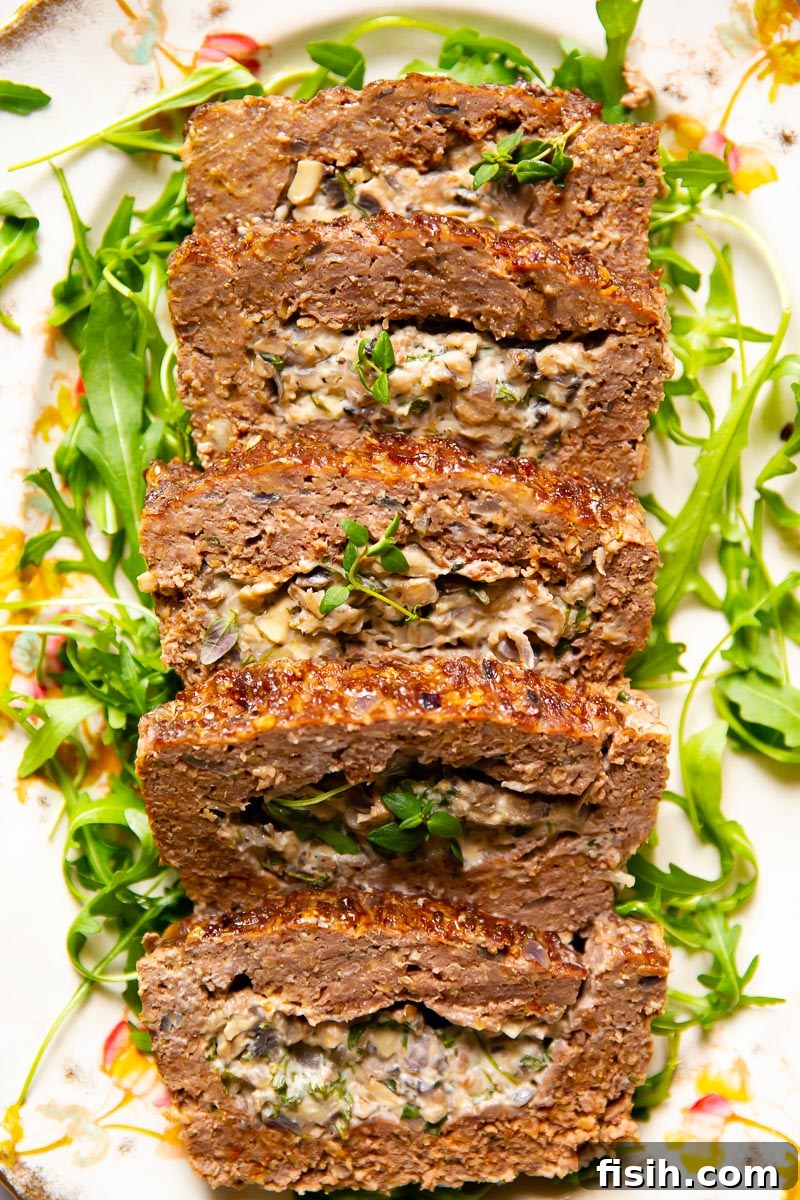Gourmet Stuffed Meatloaf with Creamy Mushrooms 6 Meatloaf stuffed with creamed mushrooms with herbs and garlic.
