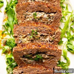 Gourmet Stuffed Meatloaf with Creamy Mushrooms 7 Meatloaf stuffed with creamed mushrooms with herbs and garlic.