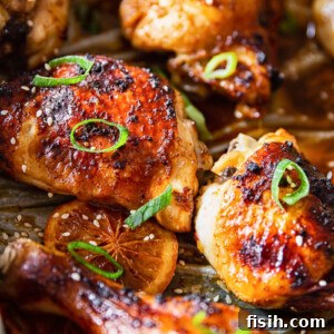Sweet and Sticky Oven-Baked Chicken Thighs and Drumsticks 9 Honey Soy Chicken Thighs and Legs in roasting pan