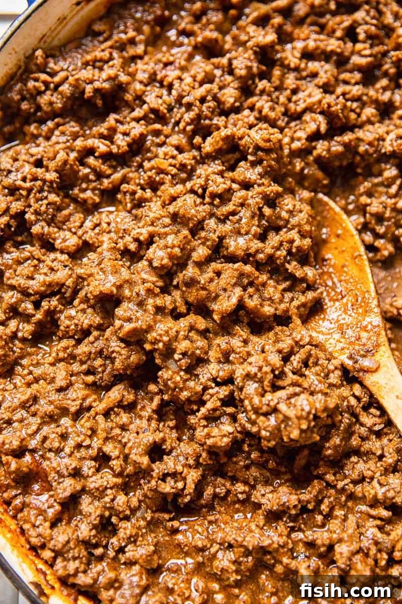 Close-up shot of perfectly seasoned Ground Beef Taco Filling, rich in color and texture, ready for assembly.